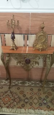 ساعت وشمعدان باکنسول .